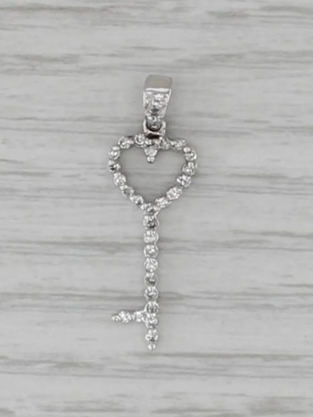0.20ctw Diamond Heart Skeleton Key Pendant 14k White Gold